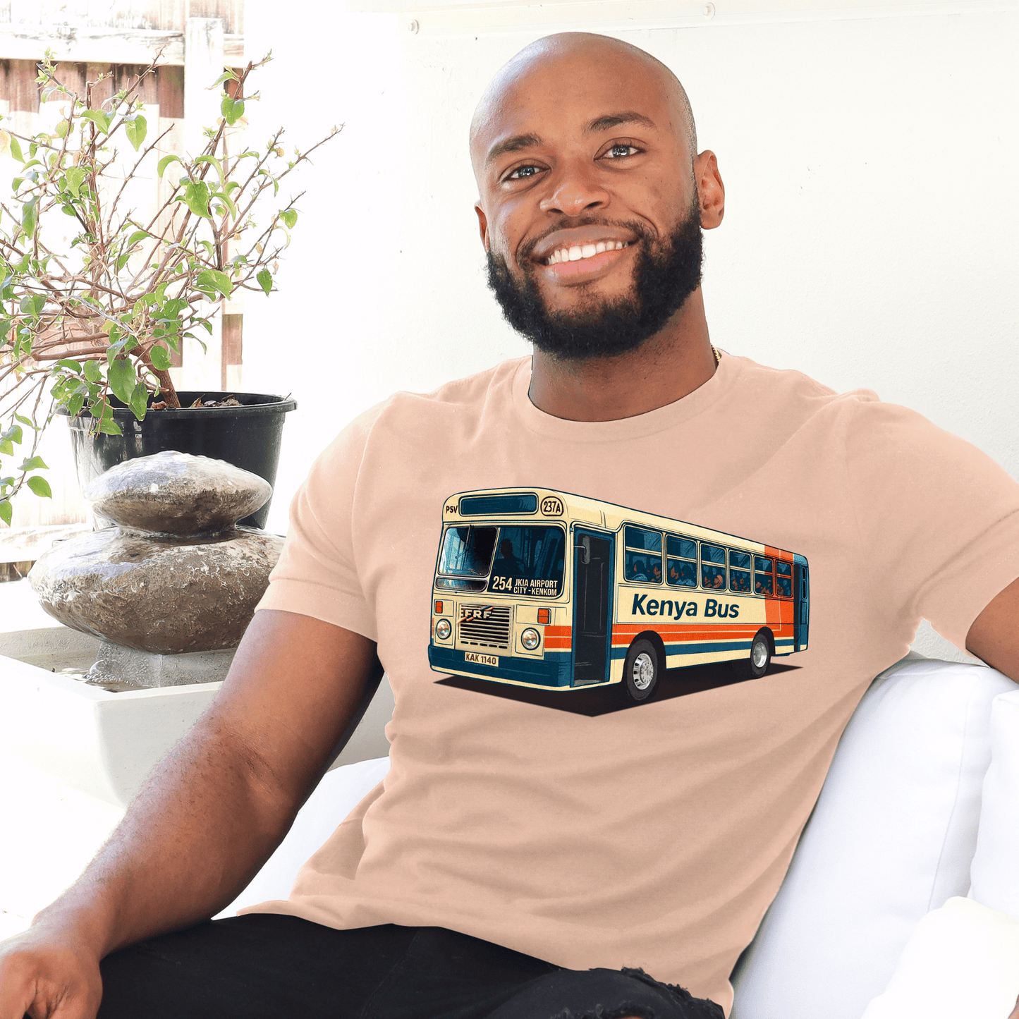 Man wearing a  t-shirt with a Kenya bus made by marto and t-shirts